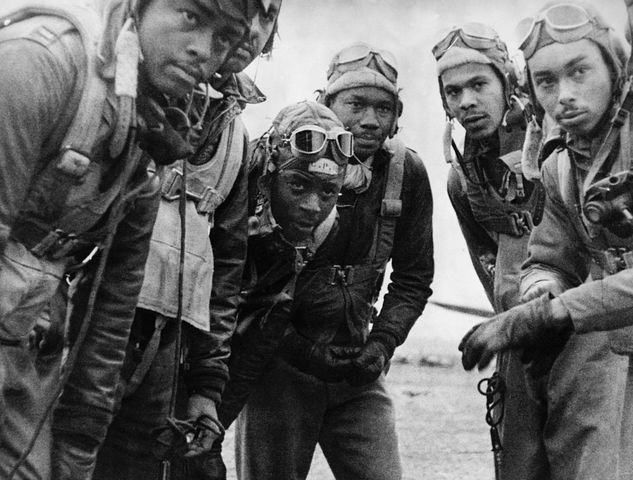 Black Americans, like these Tuskegee Airmen, served their country in World War II but returned home to face discrimination.