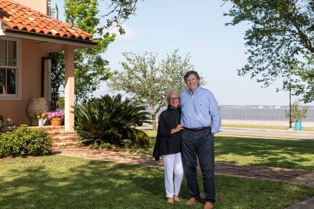 Teri and Jim Wyly outside their Bay St. Louis, Miss., home