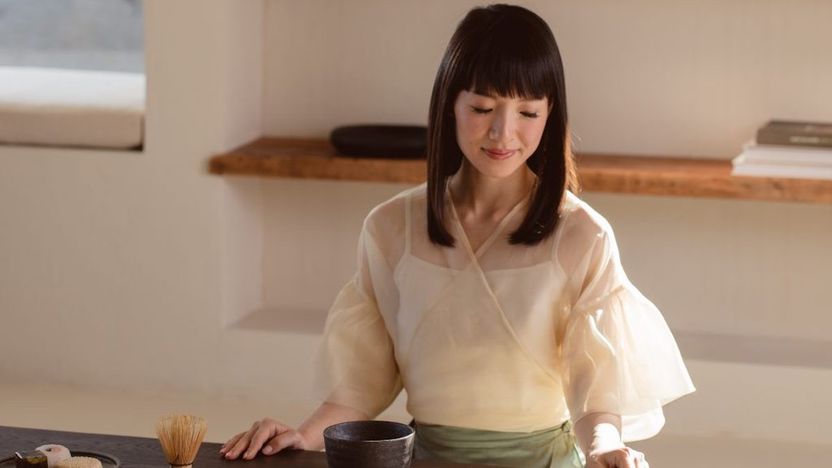 Marie Kondo practices category-based decluttering.