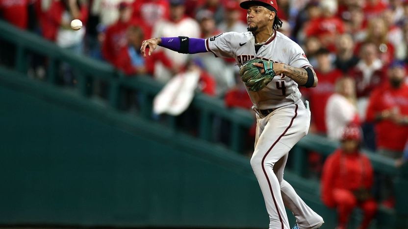 Ketel Marte #4 of the Arizona Diamondbacks fields a hit in the seventh inning against the Philadelphia Phillies during Game Six of the Championship Series at Citizens Bank Park
