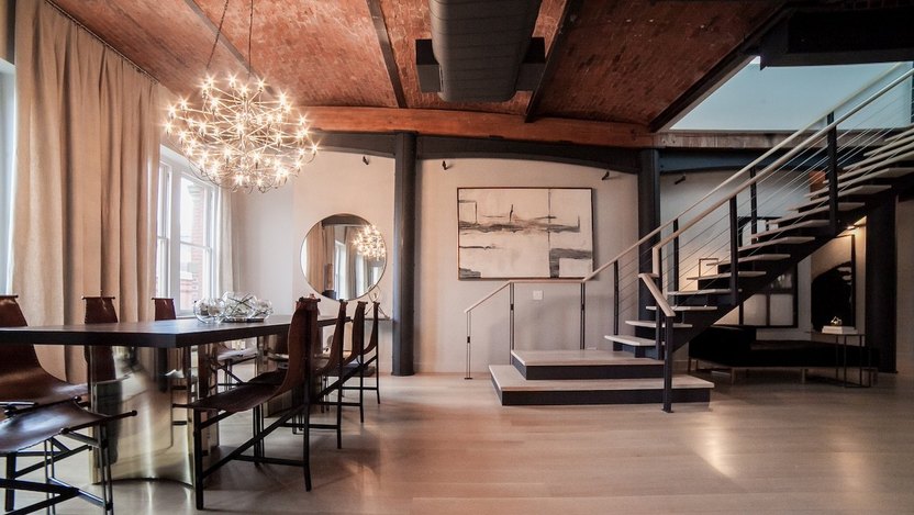 Eisen furnished Zayn Malik's New York loft with leather sling dining chairs.